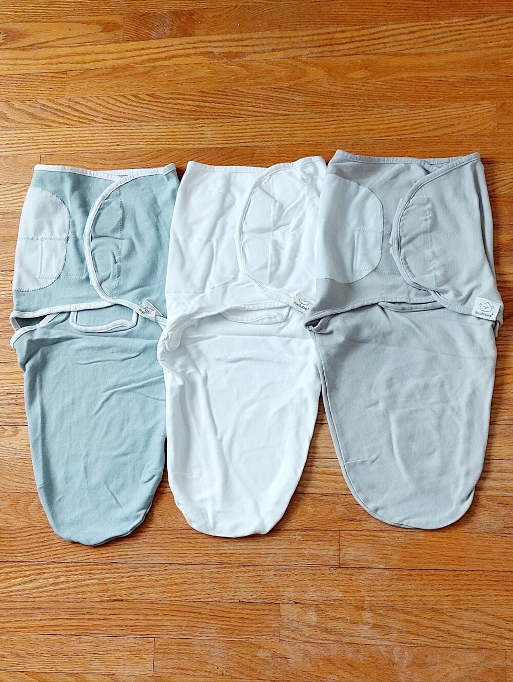 KeaBabies 3-Pack Baby Swaddle Sleep Sacks in Sage, White, and Light Gray